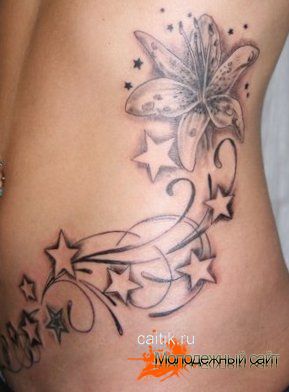 женская татуировка со звездами