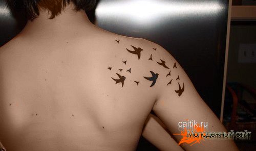 татуировка летящая стая птиц