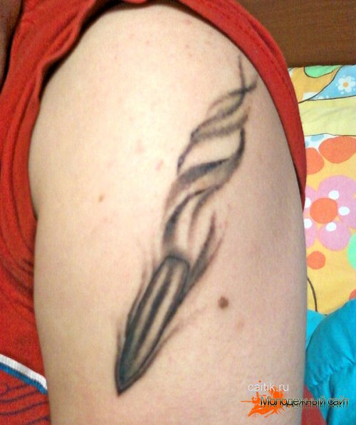 татуировка пуля на плече