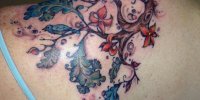татуировка дерево на шее